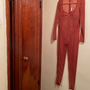 Skims NWT Sheer Catsuit in a size 2X in pristine condition.